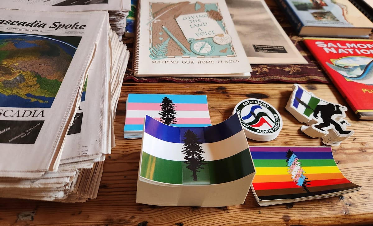 A collection of Cascadia flag stickers including a queer flag sticker, trans pride sticker, and anti-fascist sticker