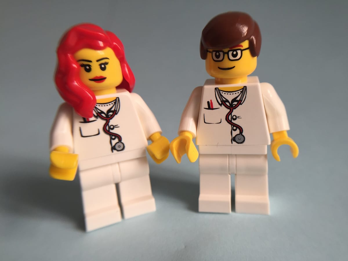 Two Lego figures that look like doctors.